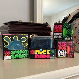 Needoh splat nice berg fuzz ball lot new contains all 4